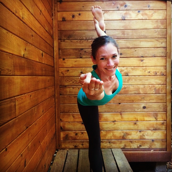 Lacie Gibson practicing yoga outdoors